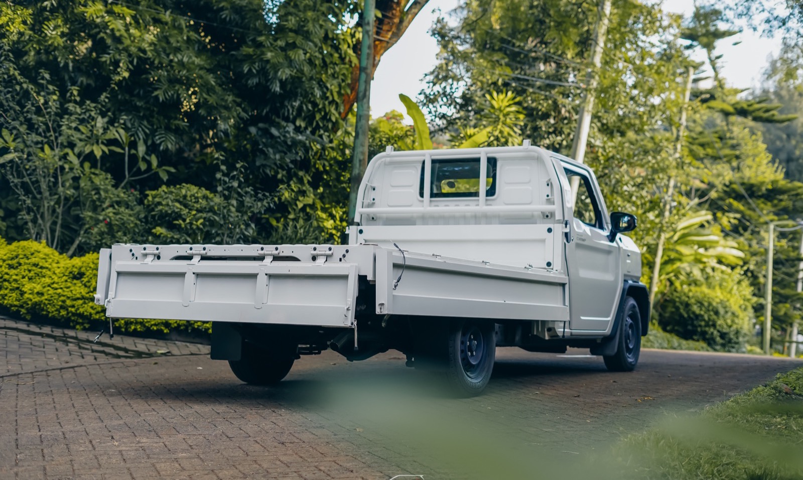 Omni Cargo Hilux Champ with drop-sides open