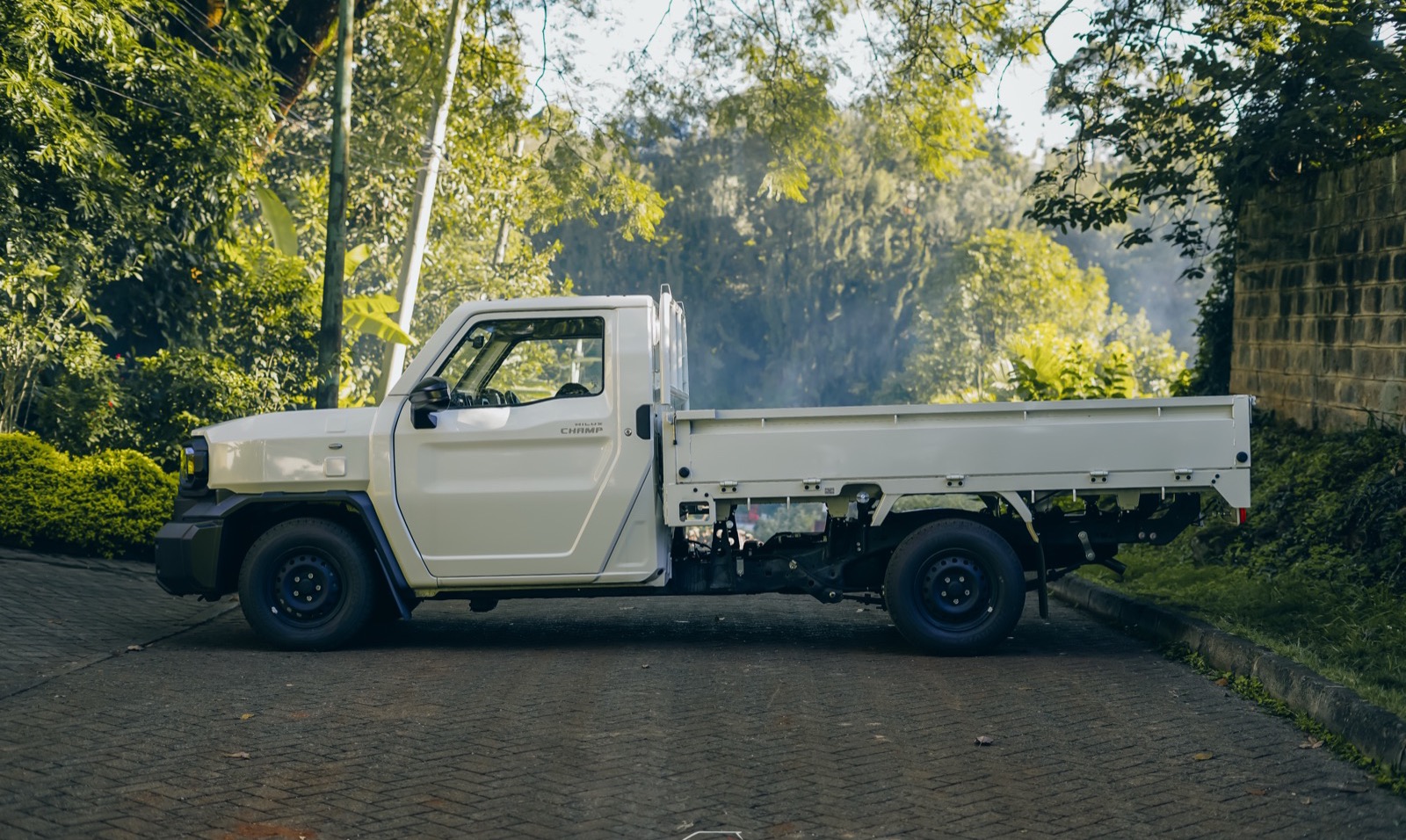 2024 Toyota Hilux Champ side profile with full flat deck